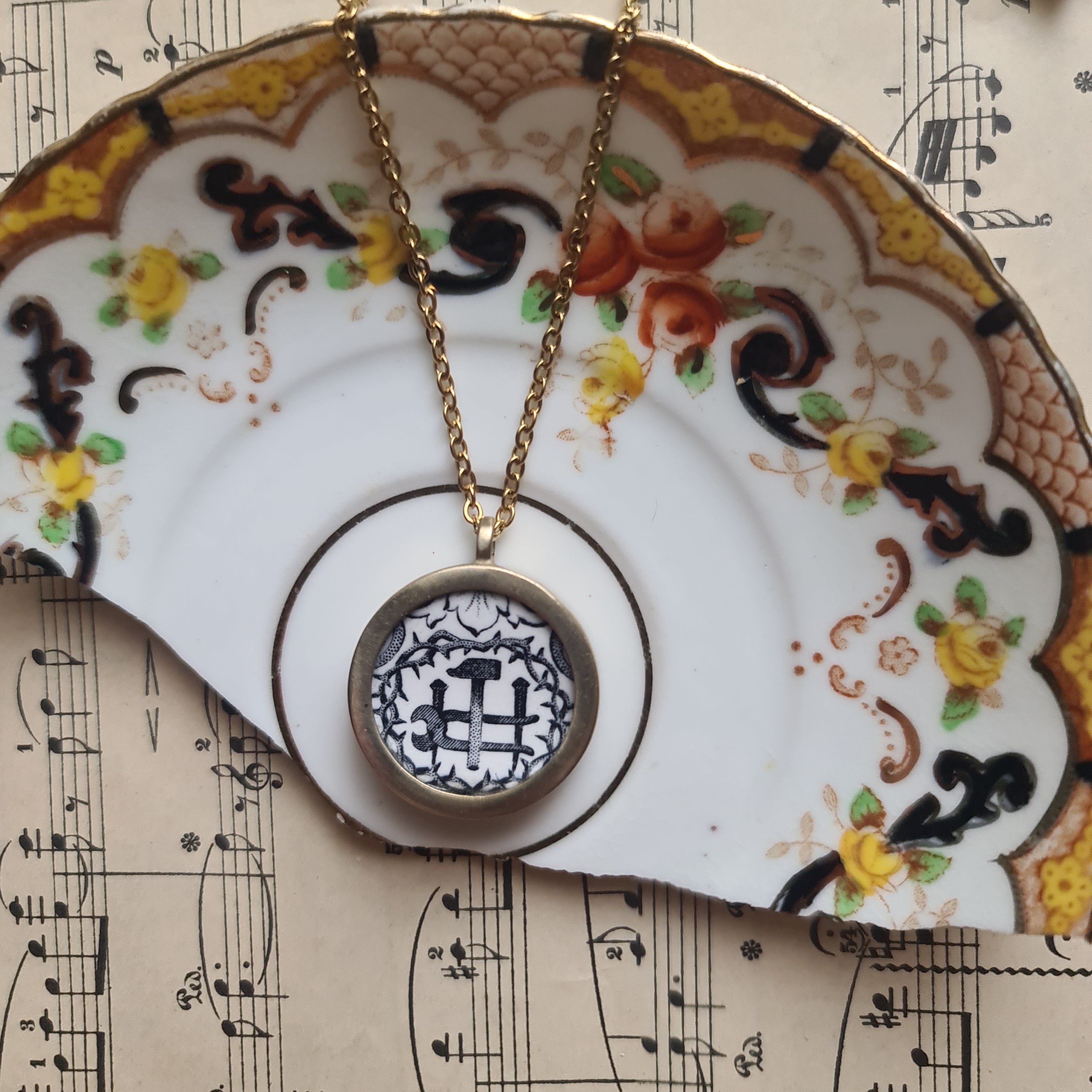 Collana piccola simboli del martirio