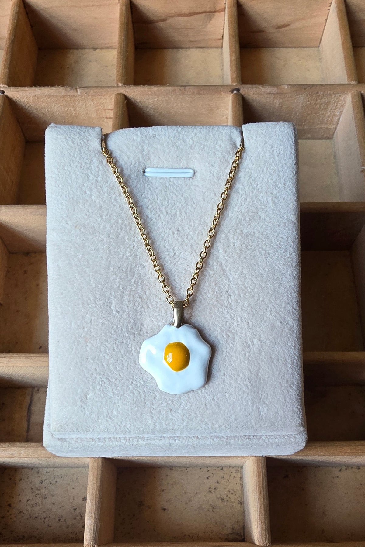 Collana Pendente Uovo Rotto