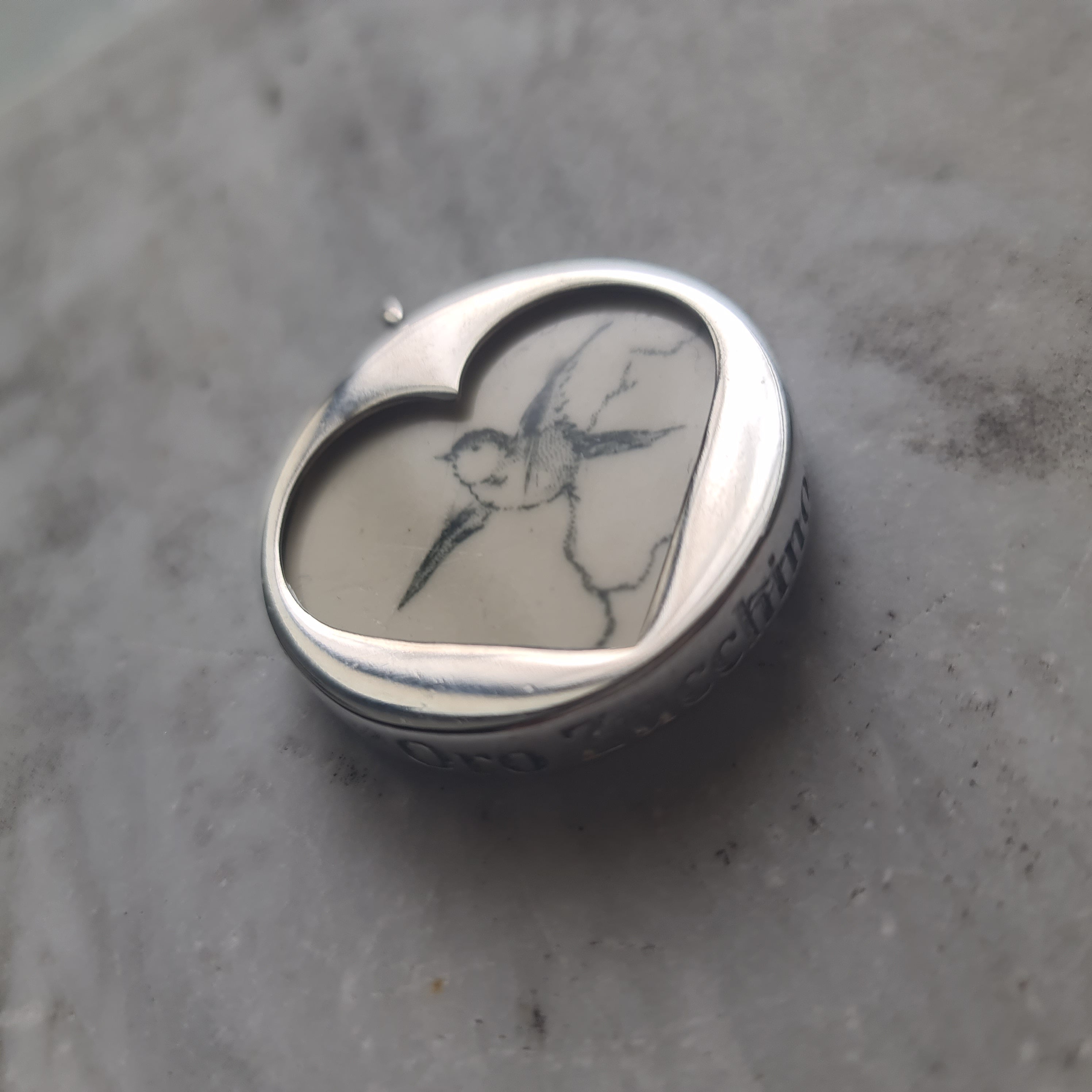 Cuore con uccellino in volo