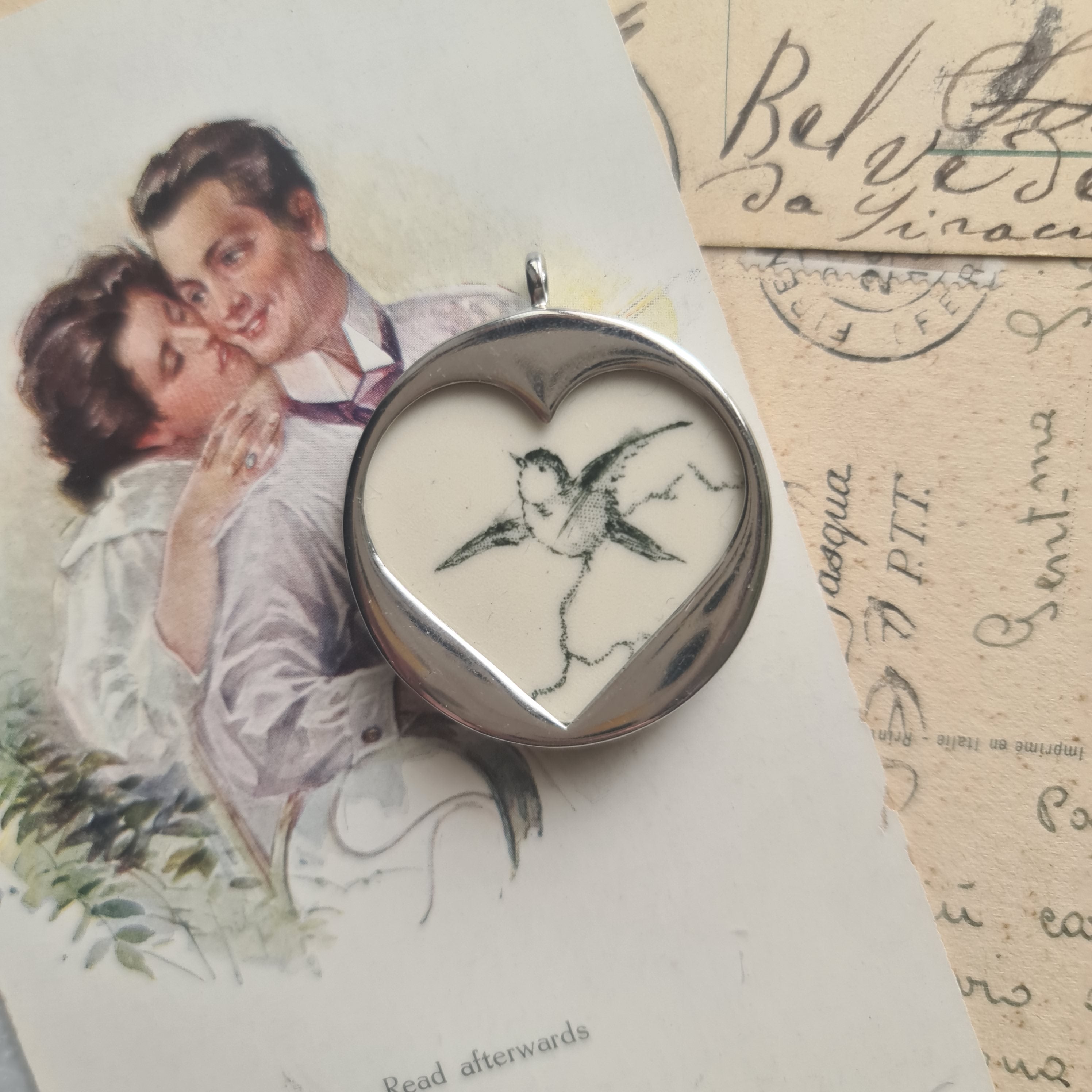 Cuore con uccellino in volo