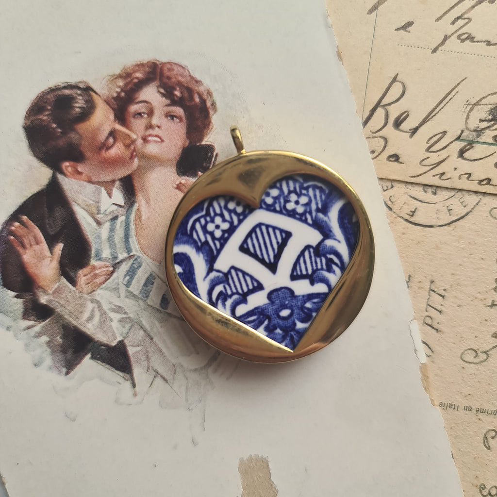 Cuore con simbolo blu